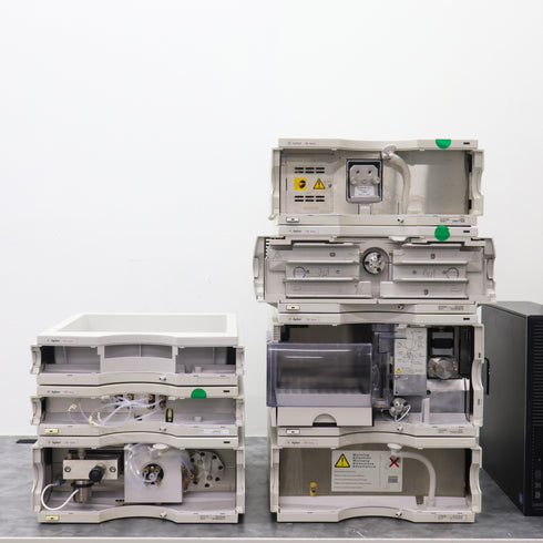 Photo of Agilent 1100 HPLC system with VWD and Quaternary Pump. Front panel open showing internal components.