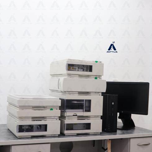 Photo of Agilent 1100 HPLC System with VWD and Quaternary pump in left corner view.