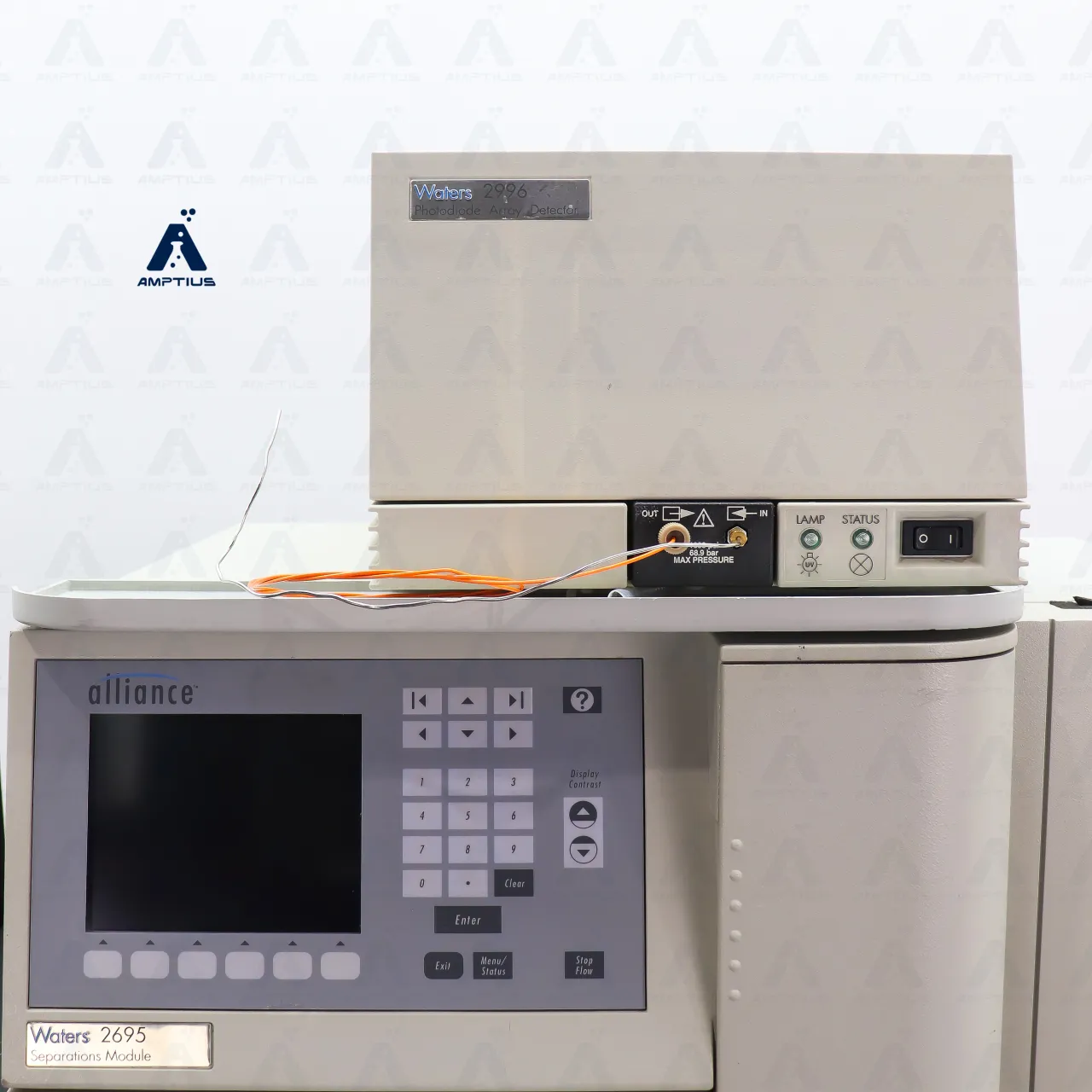 Photo of a Waters 2996 PDA Detector on top of Waters Alliance 2695, showing control panel buttons.